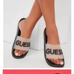 NWT women Guess slide sandlas , size 7